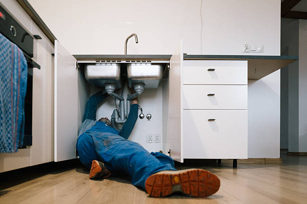 Professional Plumbing technician working in Crosby, ND